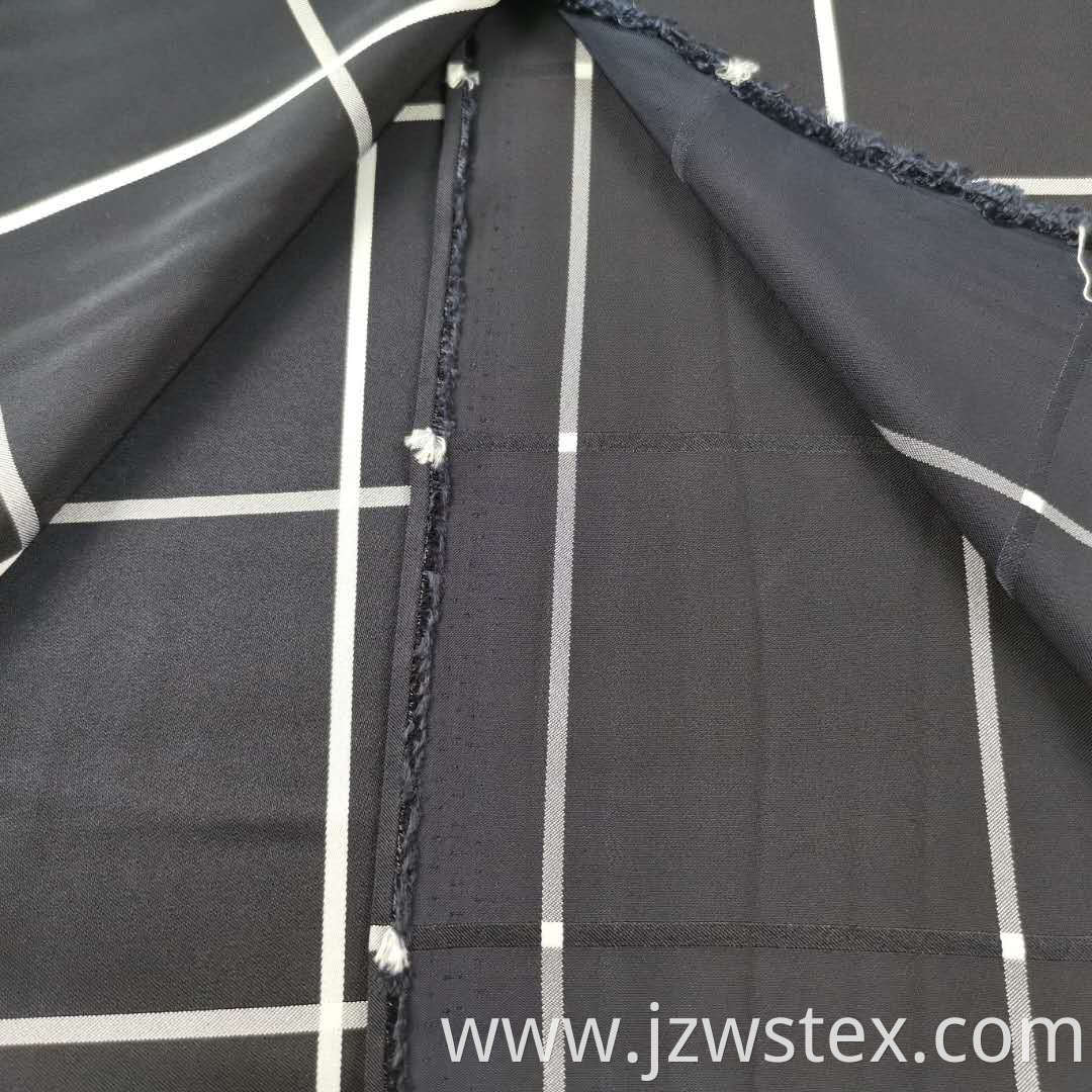 Satin Elasticity in All Directions Black background and white stripe in Yarn-dyed fabrics